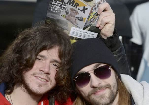 Kyle Falconer and Steven Morrison selling The Big Issue on Princes Street. Picture: Julie Bull