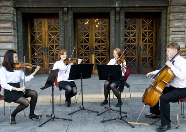 St Mary's Music School pupils rehearse in front of the Usher Hall. Picture: Ian Georgeson