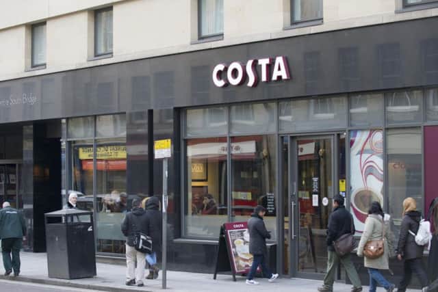 The woman emerged from the Costa toilet on fire. Picture: Jane Barlow
