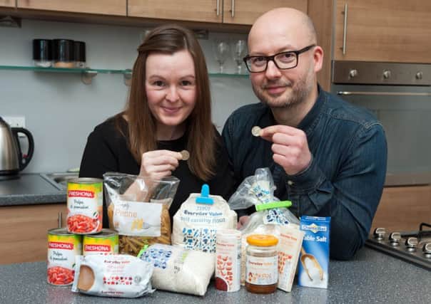 Paul and Mary Johnston are making do with supermarket 'value' products. Picture: Andrew O'Brien