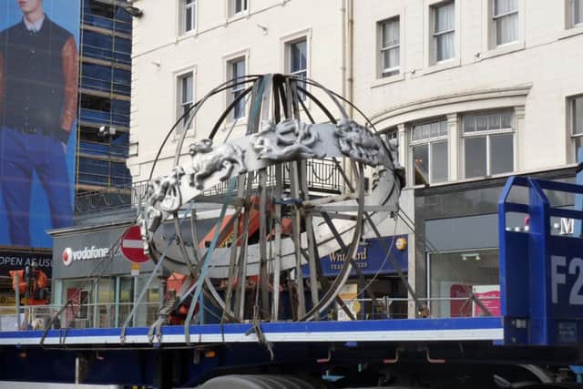 The Forsyth spire is removed for repairs in March 2012. Picture: Aaron King