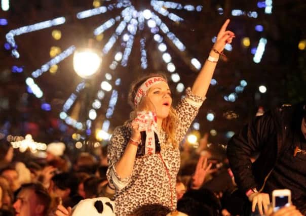 Revellers packed in tight for the Hogmanay celebrations at The Mound. Picture: SWNS