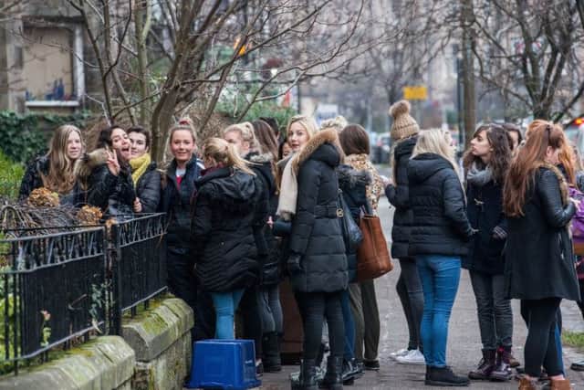 Students queue to view a flat for rent on Warrender Park Road. Picture: Ian Georgeson
