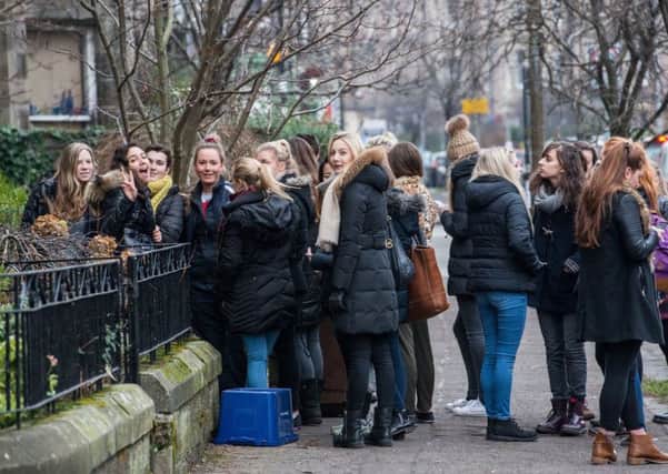 Students queue to view a flat for rent on Warrender Park Road. Picture: Ian Georgeson