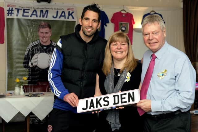 Allison Barr with Team Jak Patron Neil Alexander and Jak's Grandfather Walter Barr. Picture: Lisa Ferguson