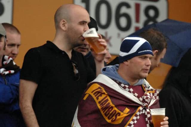Hearts fans enjoy a beer at a match during a pre-season tour of Germany. Picture: Ian Rutherford