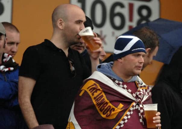 Hearts fans enjoy a beer at a match during a pre-season tour of Germany. Picture: Ian Rutherford