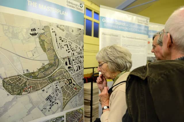 Residents view the Curriemuir plans. Picture: Neil Hanna