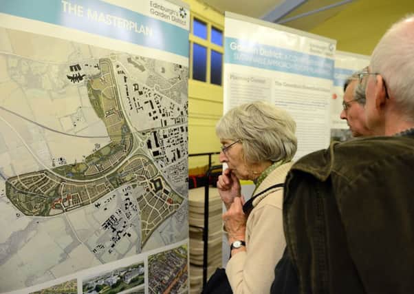 Residents view the Curriemuir plans. Picture: Neil Hanna