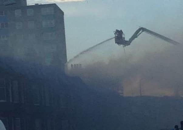 Firefighters tackle the blaze. Picture:Tbiy1971