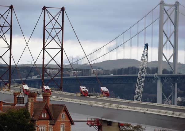 The new crossing takes shape with the old bridge in the background. Picture: Jeff J Mitchell/Getty