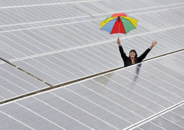 Alana Beaton shows off a solar meadow at the Midlothian Campus of Edinburgh College. Picture: Phil Wilkinson