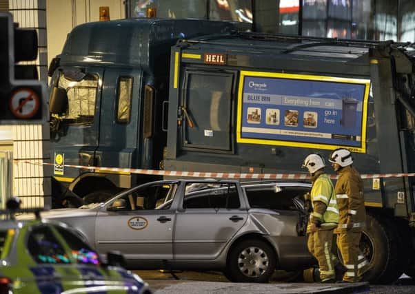 The aftermath of December's bin lorry tragedy. Picture: Robert Perry