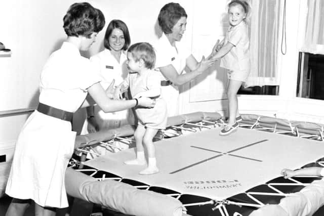 Trampolines are used at the physiotherapy department of the Sick Kids hospital in 1968; below, soldiers take it easy during Tattoo rehearsals at Redford Barracks in 1979
