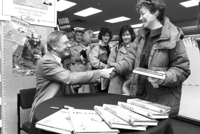 British naturalist and broadcaster David Attenborough signs copies of his book First Eden at John Menzies Princes Street store in Edinburgh, March 1987.
