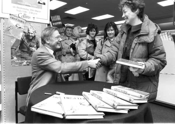 British naturalist and broadcaster David Attenborough signs copies of his book First Eden at John Menzies Princes Street store in Edinburgh, March 1987.