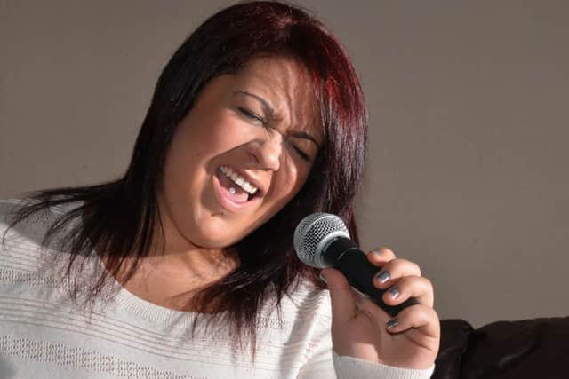 Rowan Lumsden feared she would never sing again after enduring two operations to remove her thyroid gland. Picture: Jon Savage