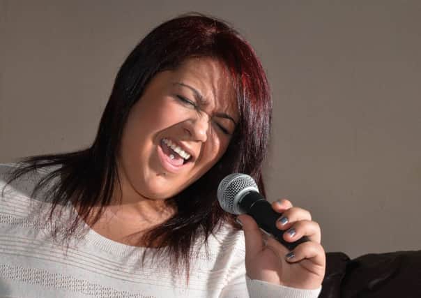 Rowan Lumsden feared she would never sing again after enduring two operations to remove her thyroid gland. Picture: Jon Savage