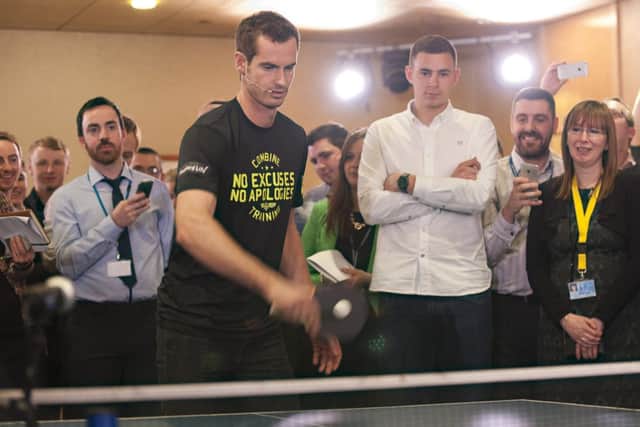 Feeling the pressure: Andy Murray demonstrates his skills with a bat. Picture: contributed