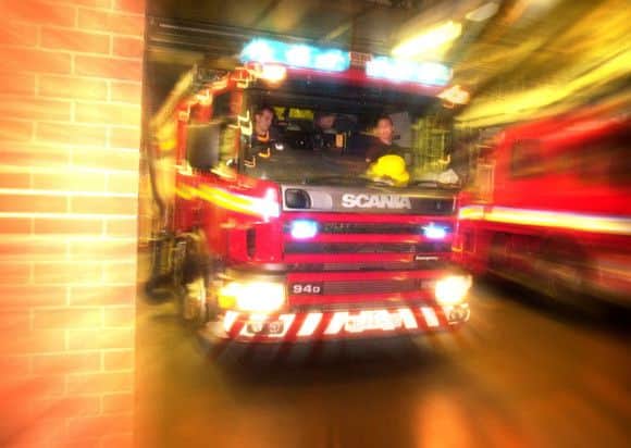 Three fire engines are at the scene. Picture: Tony Marsh