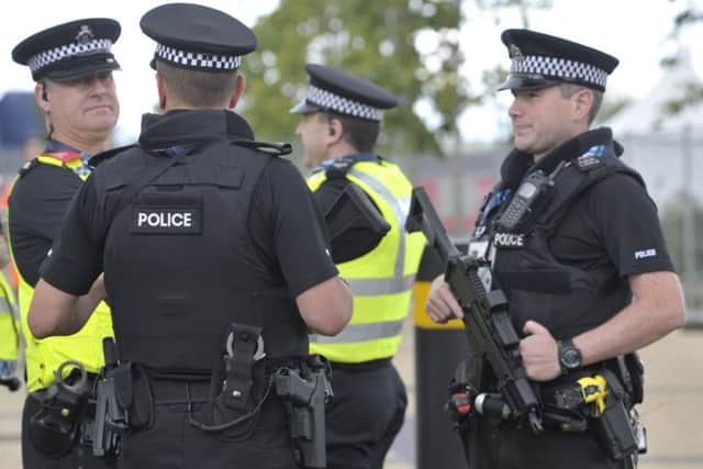 Senior officers will appear before MSPs to give evidence on the deployment of armed police. Picture: Ian Rutherford