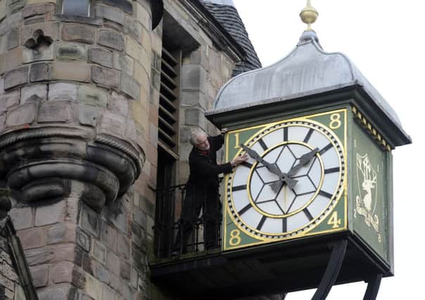 The Canongate Tollbooth clock is moved forward for the beginning of British Summer Tme. Picture: Julie Bull
