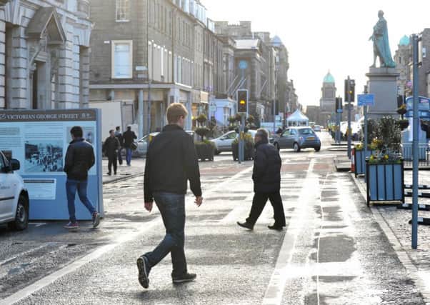 Pedestrians enjoying the traffic-free sections of George Street. Picture: Jane Barlow