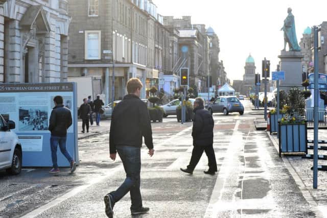 Pedestrians enjoying the traffic-free sections of George Street. Picture: Jane Barlow