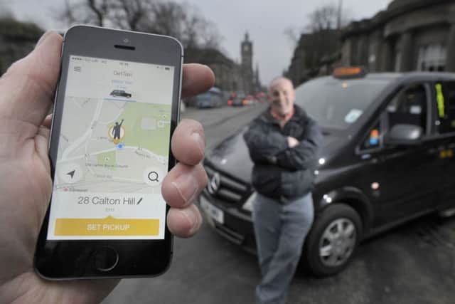 The Get Taxi app is proving popular with taxi drivers such as David Sutherland. Picture: Ian Rutherford