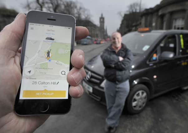 The Get Taxi app is proving popular with taxi drivers such as David Sutherland. Picture: Ian Rutherford