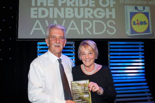 Last years overall winners Freddie and Sheila Buchanan with their award. Picture: Ian Georgeson