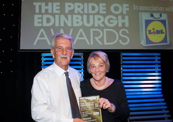 Last years overall winners Freddie and Sheila Buchanan with their award. Picture: Ian Georgeson