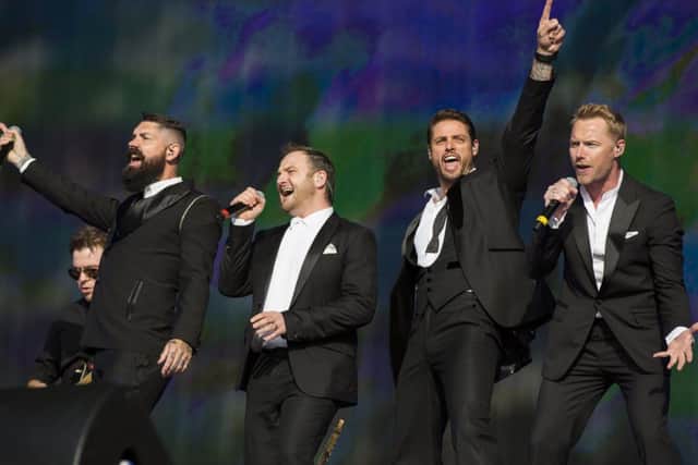 Shane Lynch; Mikey Graham; Keith Duffy and Ronan Keating of Boyzone in action. Picture: Tristan Fewings/Getty Images