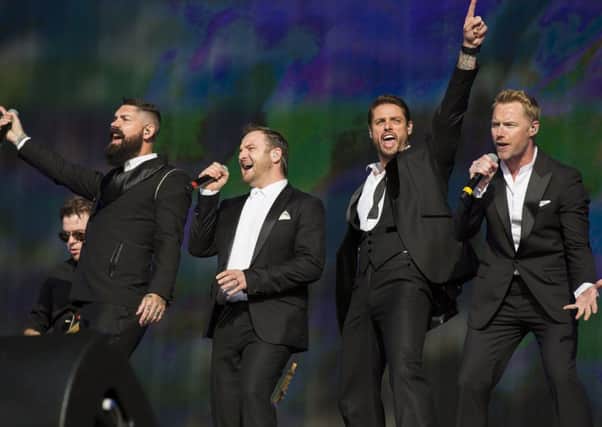 Shane Lynch; Mikey Graham; Keith Duffy and Ronan Keating of Boyzone in action. Picture: Tristan Fewings/Getty Images