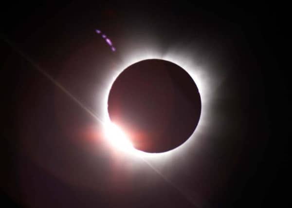 The partial solar eclipse will be seen at 9.30 on Friday. Pic: AP