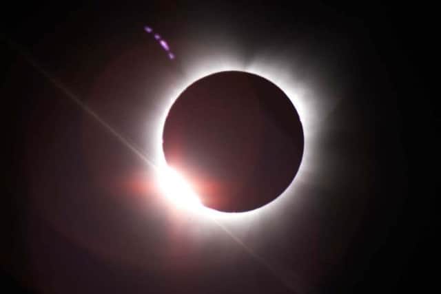 The partial solar eclipse will be seen at 9.30 on Friday. Pic: AP