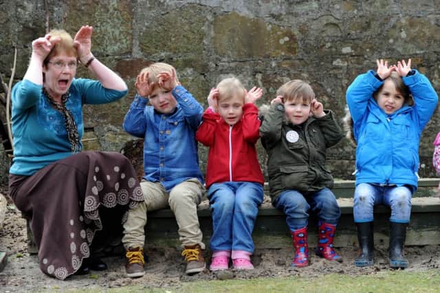 Nursery owner Alison Hawkins plays with Leo Gilmour, Audrey Forsyth, Aaron Hawkins and Emilia Douglas-Home. Picture: Lisa Ferguson