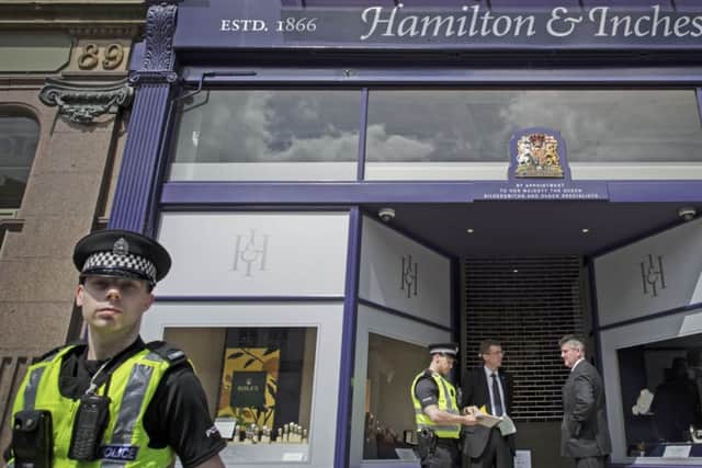 Police at the Hamilton and Inches robbery on George Street aftet the robbery. Pic: Steven Scott Taylor.