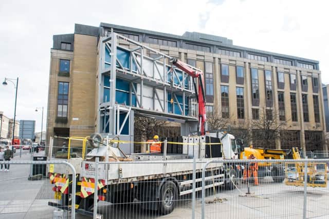 Festival Square's big screen TV is dismantled. Picture: Ian Georgeson