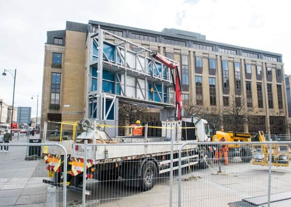 Festival Square's big screen TV is dismantled. Picture: Ian Georgeson
