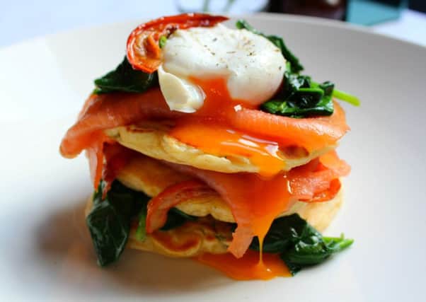 Sweetcorn and Basil Fritters, Smoked Salmon, Wilted Spinach, Semi-Dried Tomato, Poached Egg. Picture: Comp