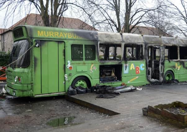 The burnt-out classroom bus at Murrayburn Primary. Picture: Julie Bull