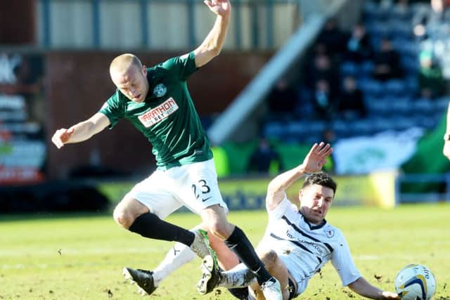 Raith Rovers' Liam Fox tackles Dylan McGeouch. Picture: SNS