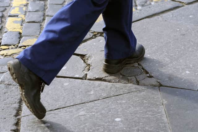 A cracked pavement around The Huxley in the West End. Picture: Lisa Ferguson
