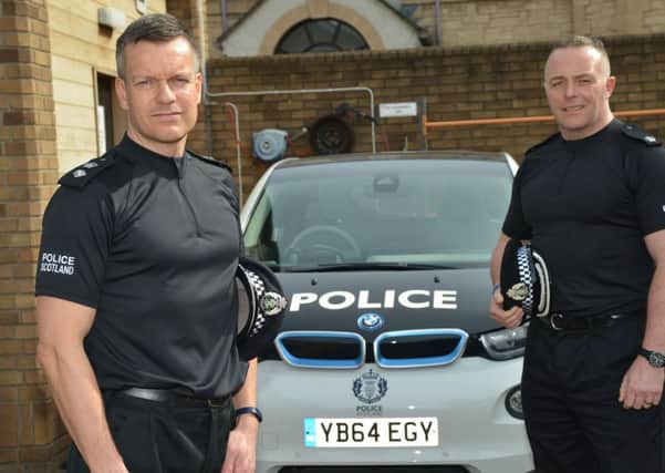 Chief Superintendent Mark Williams, far left, and Supt Matt Richards are targeting the gang in a direct operation involving 100 police officers