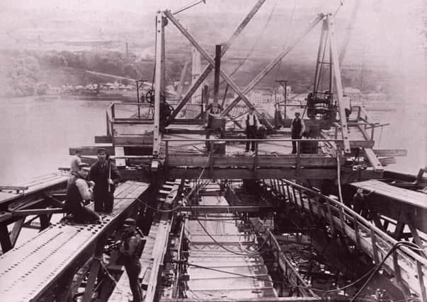 Workers riveting the Queensferry cantilever in June 1888.