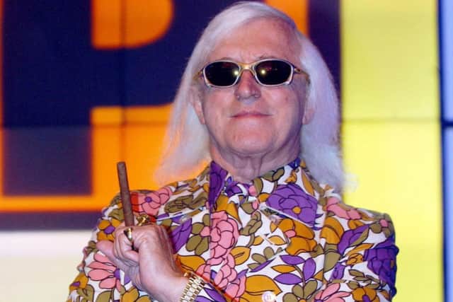 Jimmy Savile presented many editions of Top Of The Pops. Picture: PA