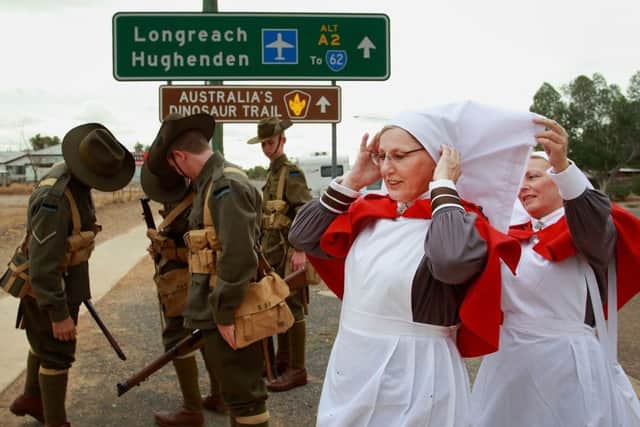 Soldiers and volunteers prepare to take part in reenactment events in Australia yesterday. Pictures: PA/Getty Images