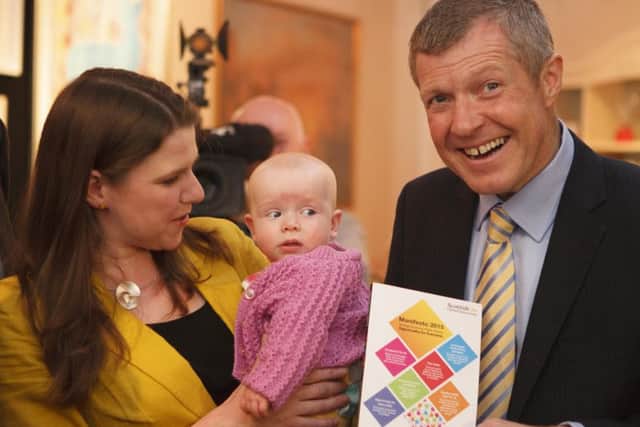 Willie Rennie and Jo Swinson are joined by four-month-old Martha Milne a the launche of the Lib Dem manifesto. Picture: Toby Williams