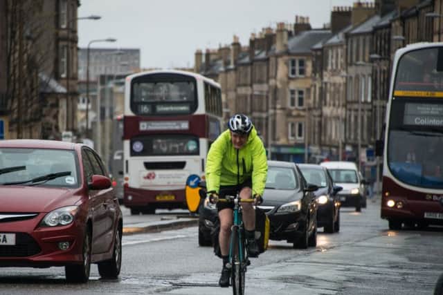 A cyclist on Leith Walk. Picture: Andrew O'Brien